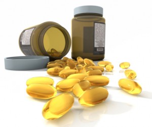 Vitamin E gel capsules and bottle